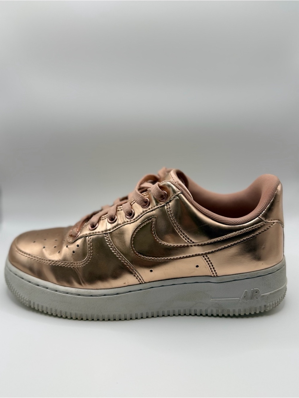 Nike Air Force 1 Women's Metallic Rose Gold Low-Top Sneaker